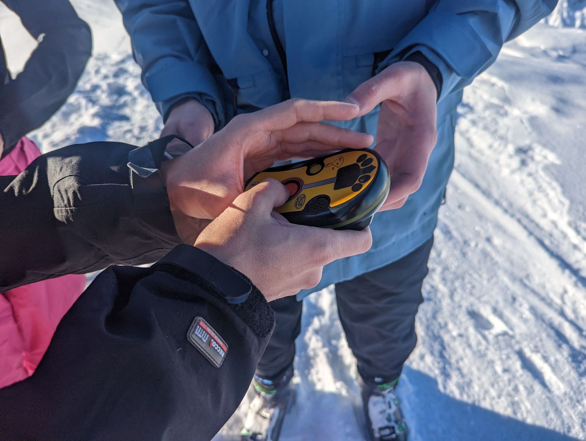 A skier tests an avalanche transceiver
