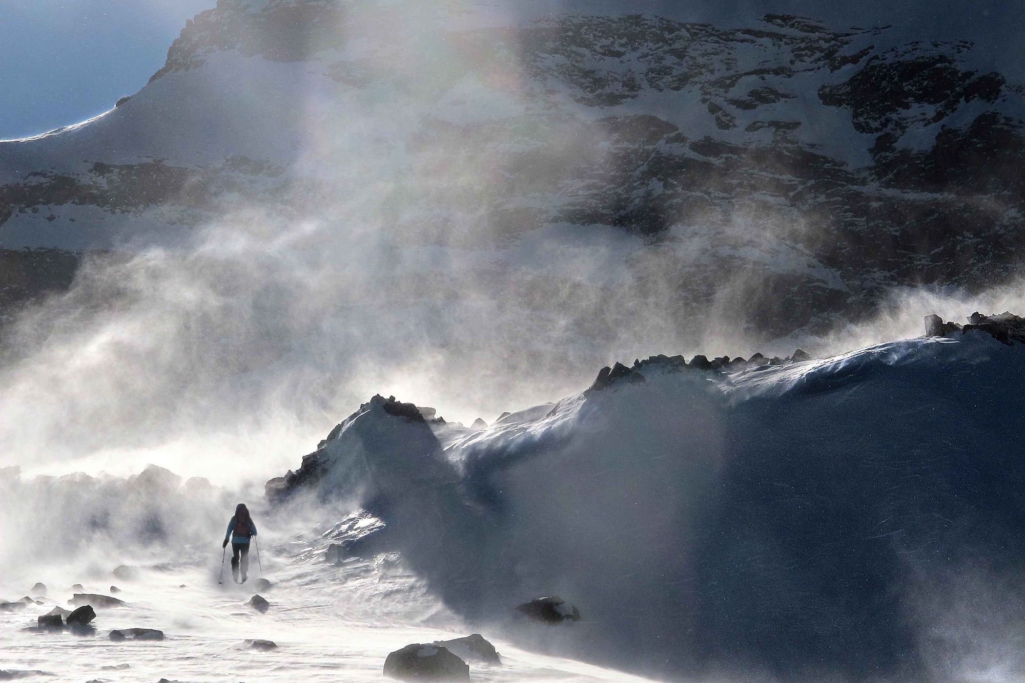 Ski touring on a cloudy winter's day in the mountains