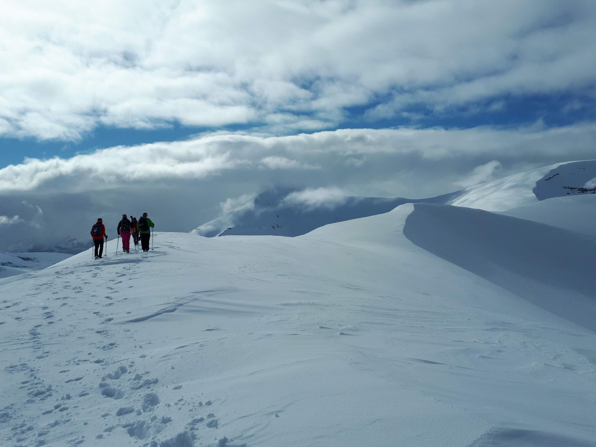People trekking in the mountains surrounding Longyearbyen