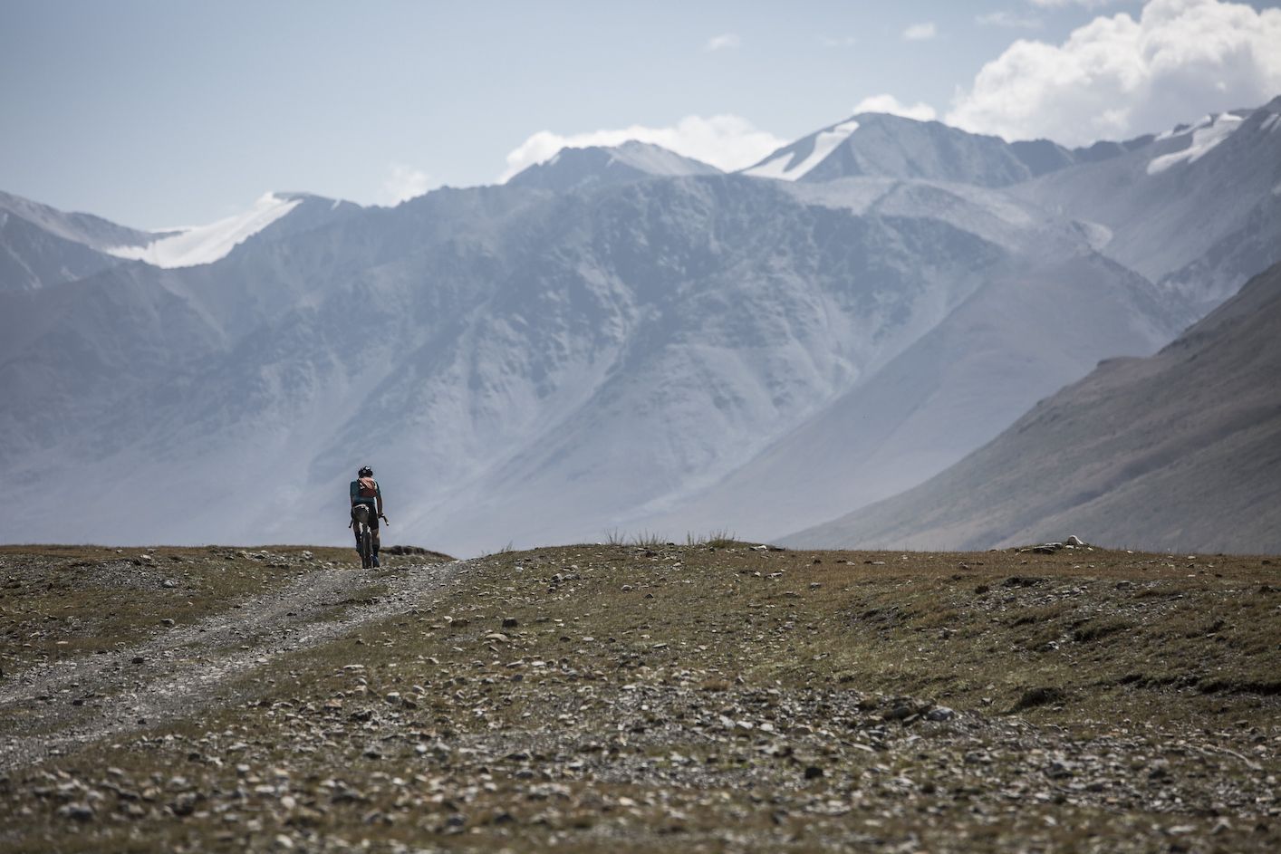 A cyclist on a solo ride through Kyrgyzstan.