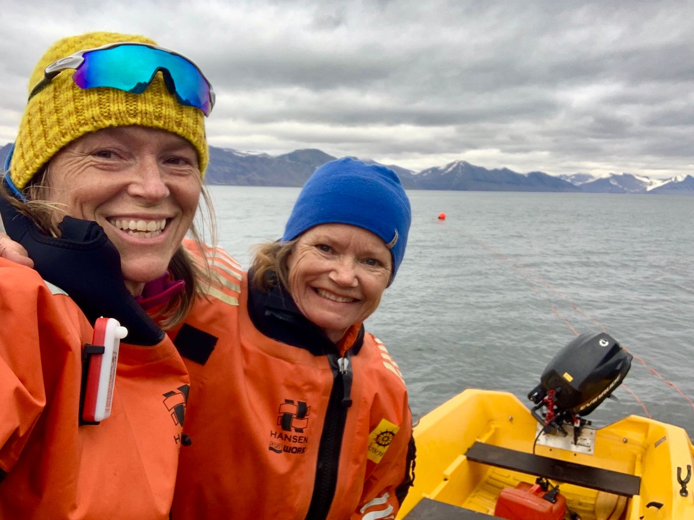 Hilde Fålun Strøm (left) and Sunniva Sorby (right) on a boat in Svalbard's fjords.