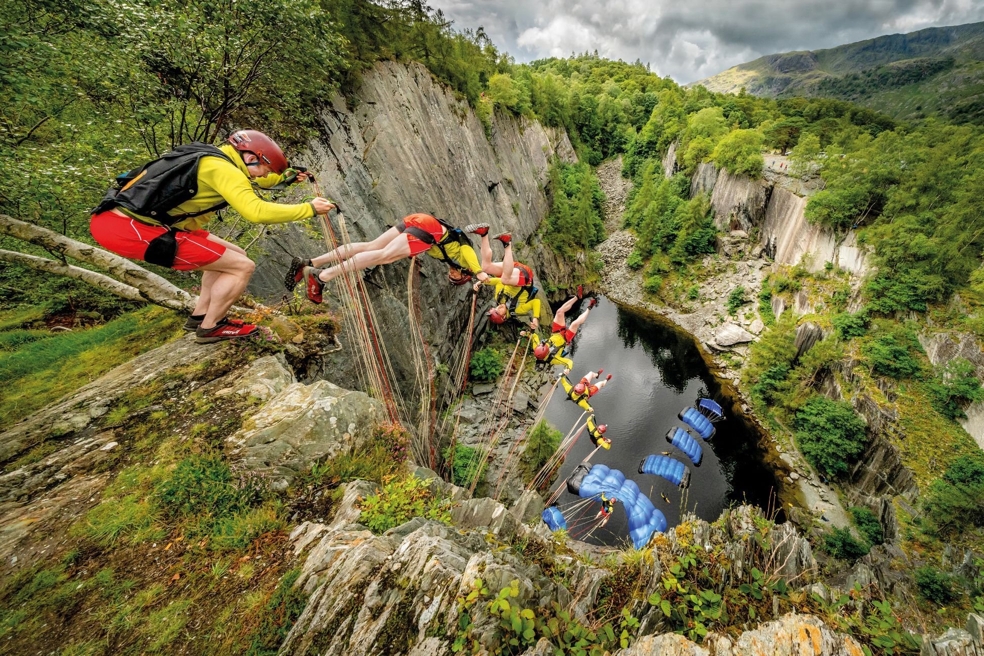 A man performs a rollover BASE jump into Hodge Close Quarry, the Lake District. Photo: Tom McNally