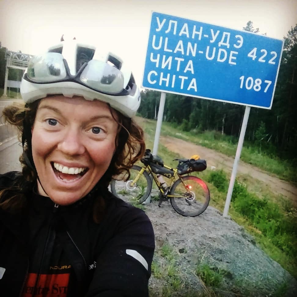 An elated Jenny with China “just around the corner”, 1087 miles away. Photo: Jenny Graham