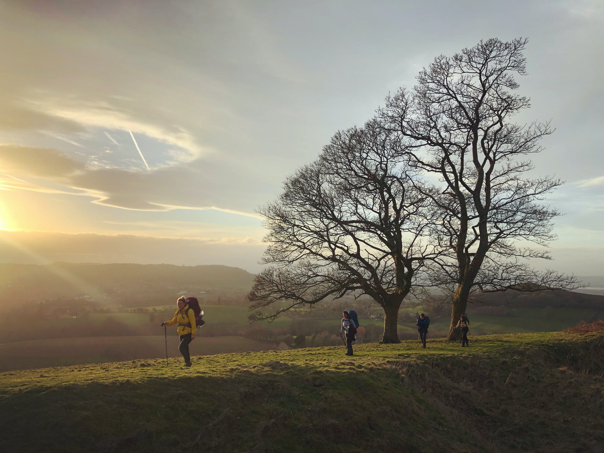 A group of hikers learning outdoors skills in the Peak District