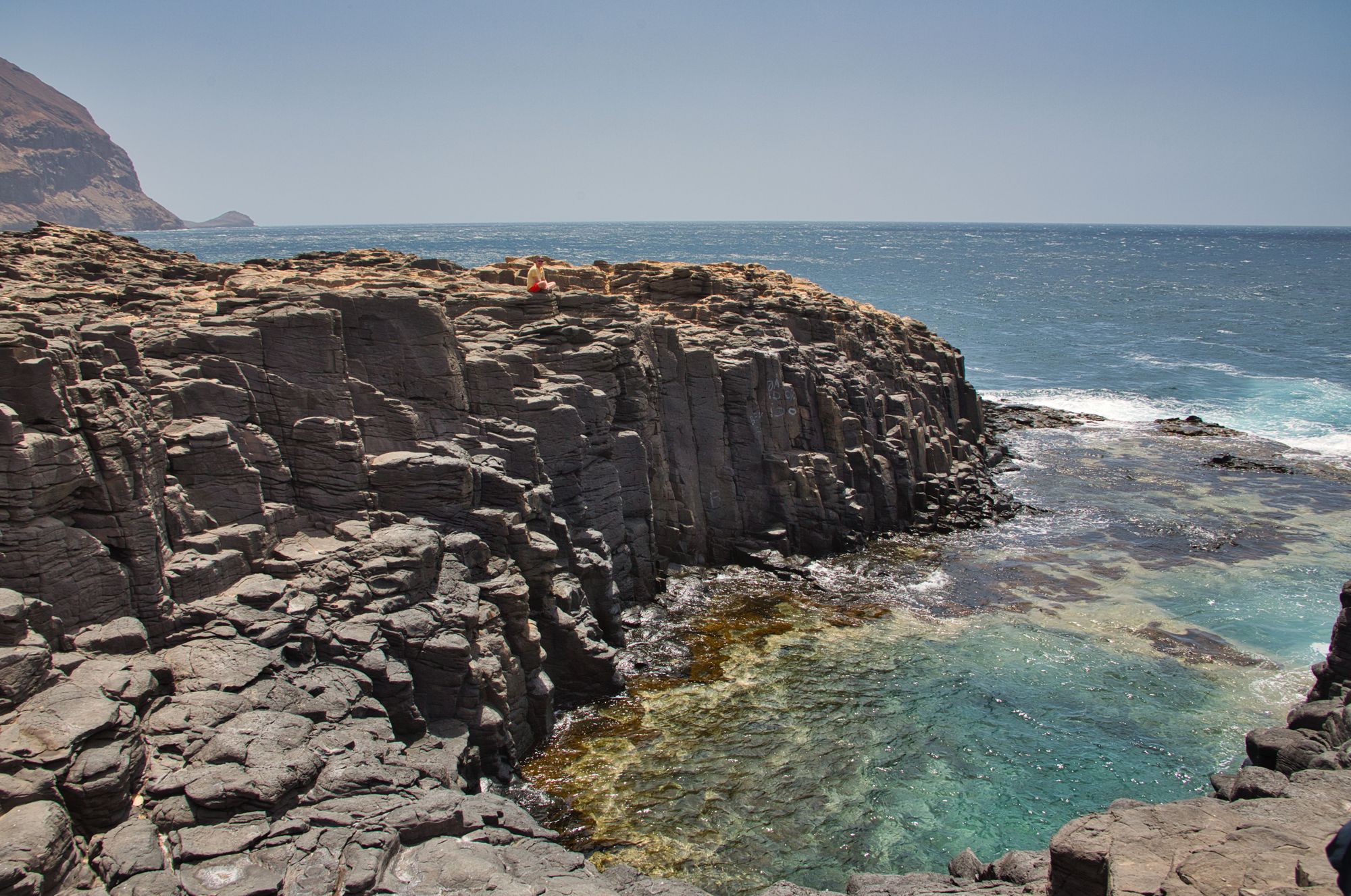 Clear sea pool by the rocky coastline in Cape Verde