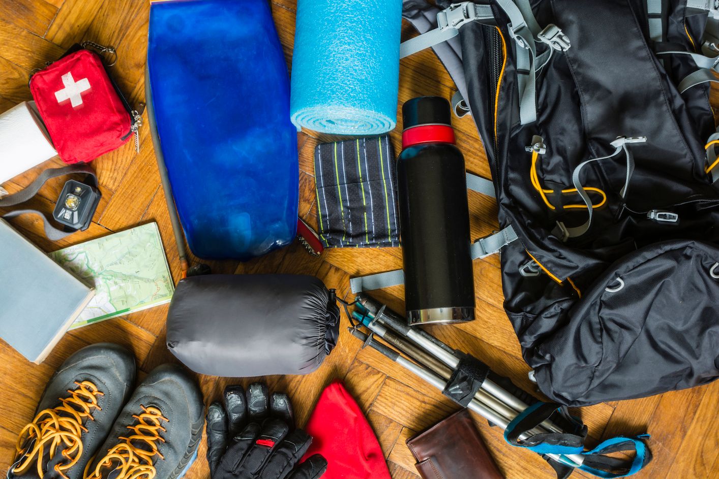 Hiking kit, including walking boots, gloves and a rucksack