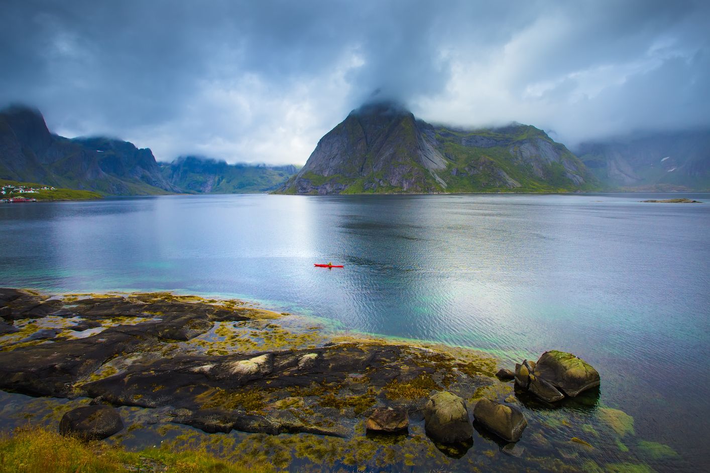 A solo kayaker in the Lofoten Islands.
