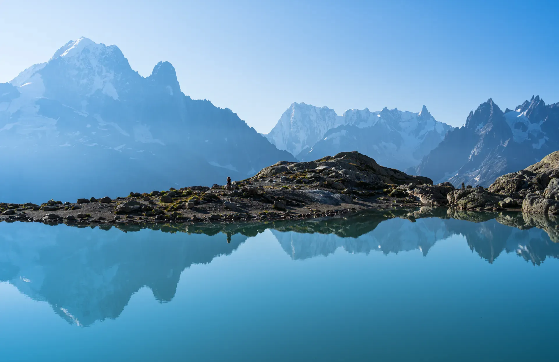 Lake and reflection of mountains in the French Alps