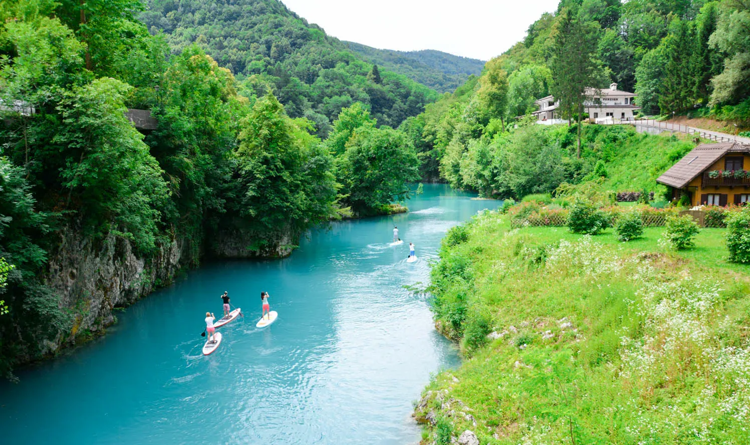 Stand up paddleboarders in Slovenia