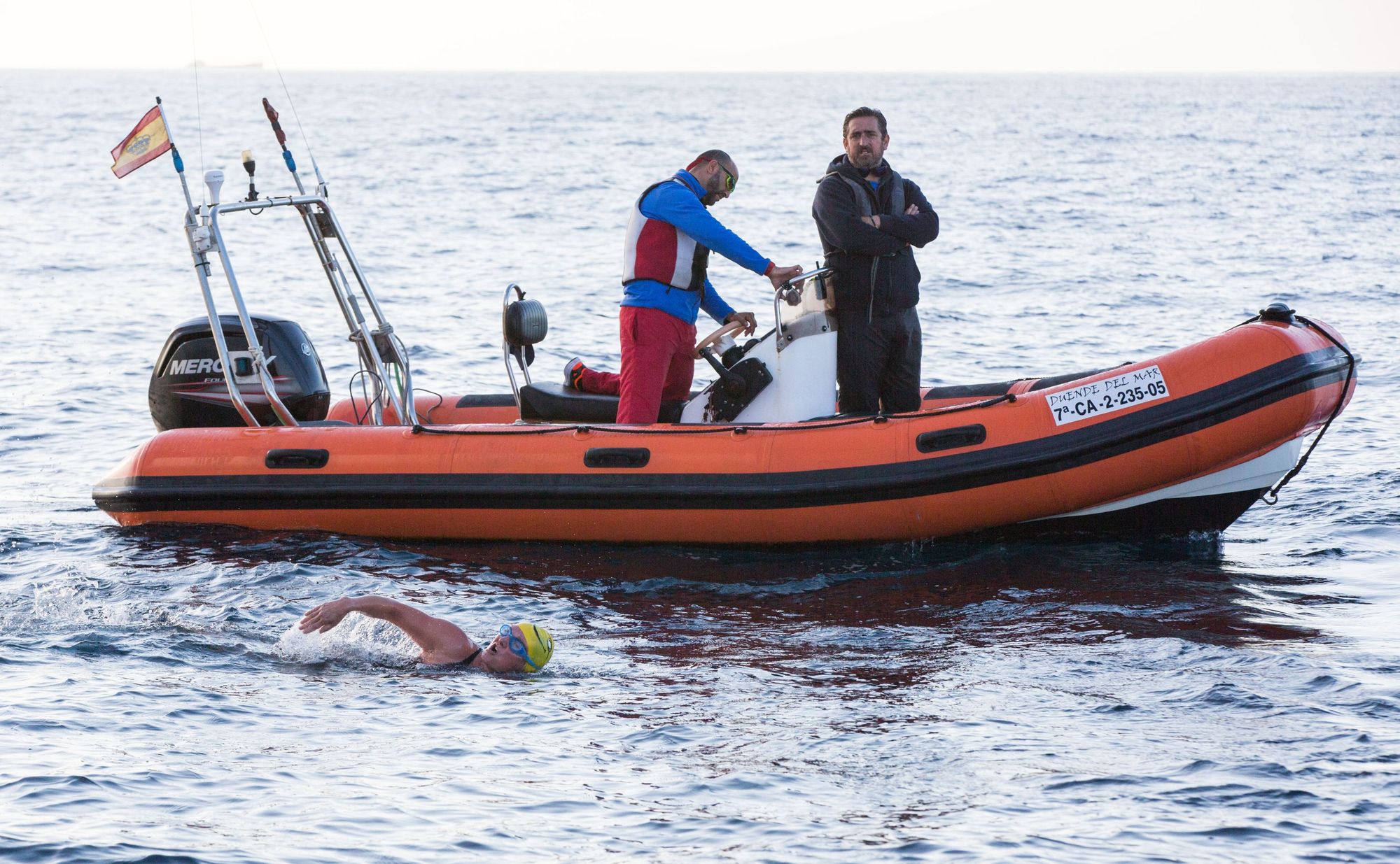 Beth French on an endurance swim, with her support crew.