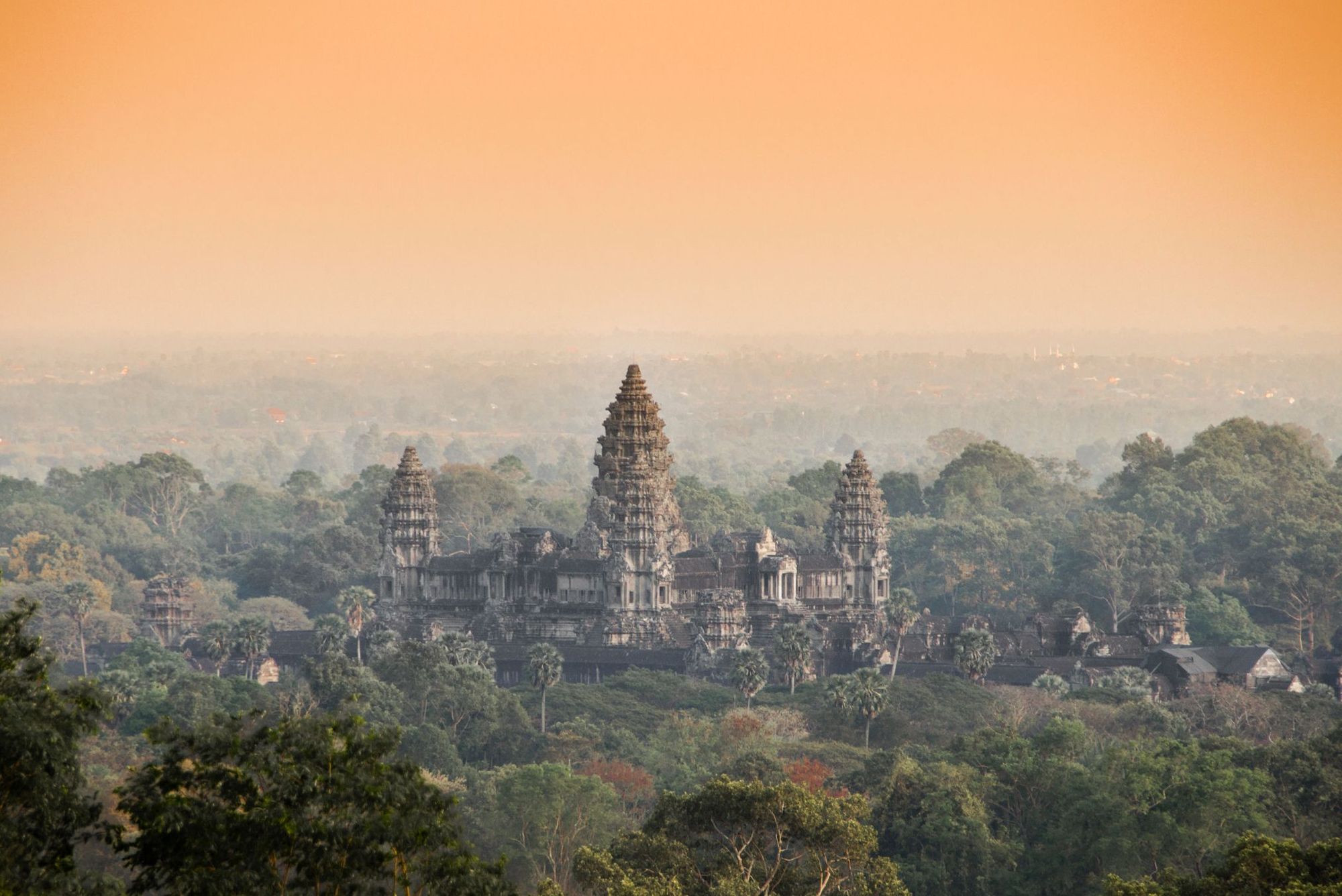 The stunning lotus bud tops of Angkor Wat, rising above the surrounding forest. Photo: Getty