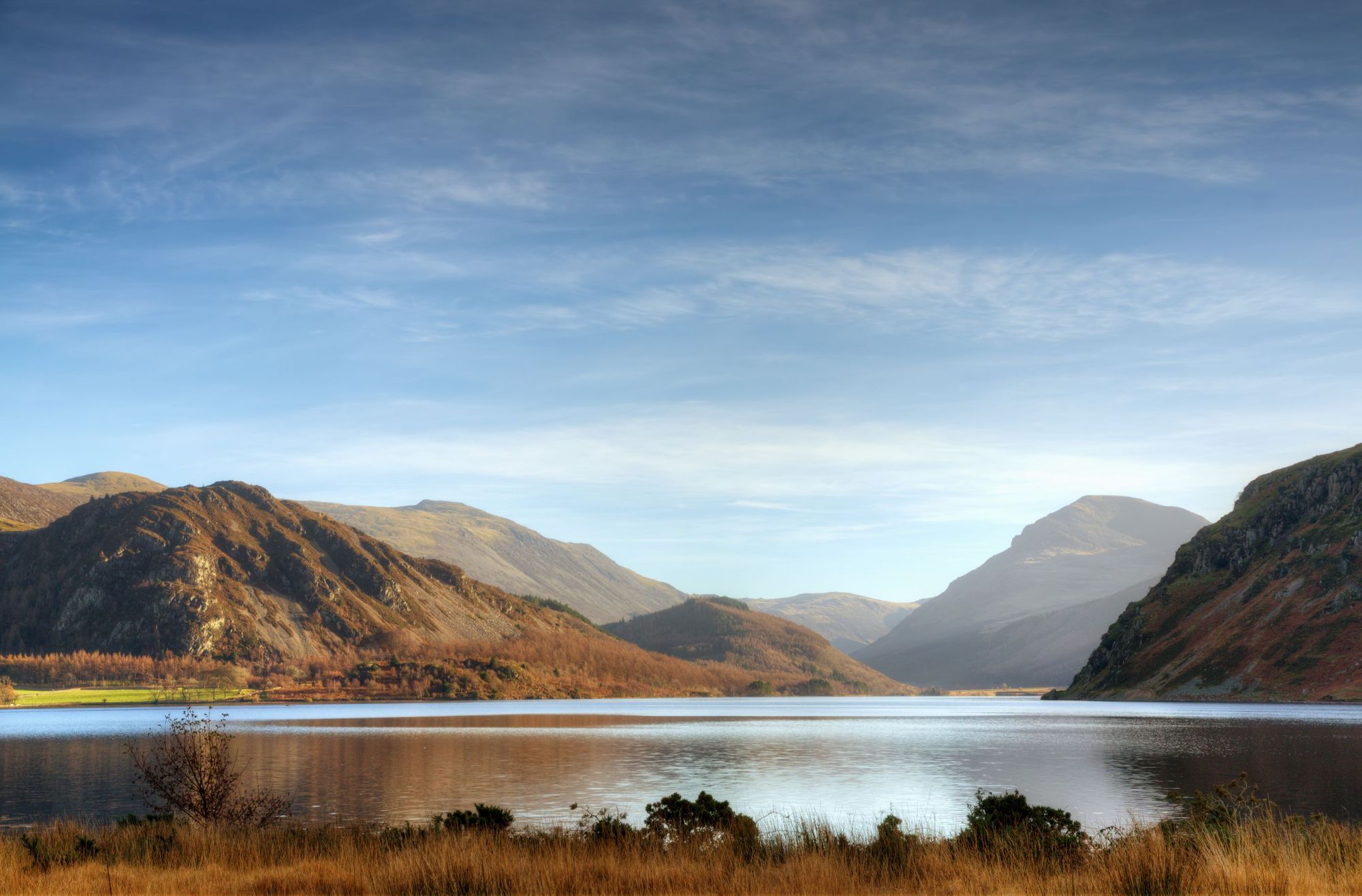 The glimmering Ennerdale Water in the Lake District, which the Coast to Coast route passes by.