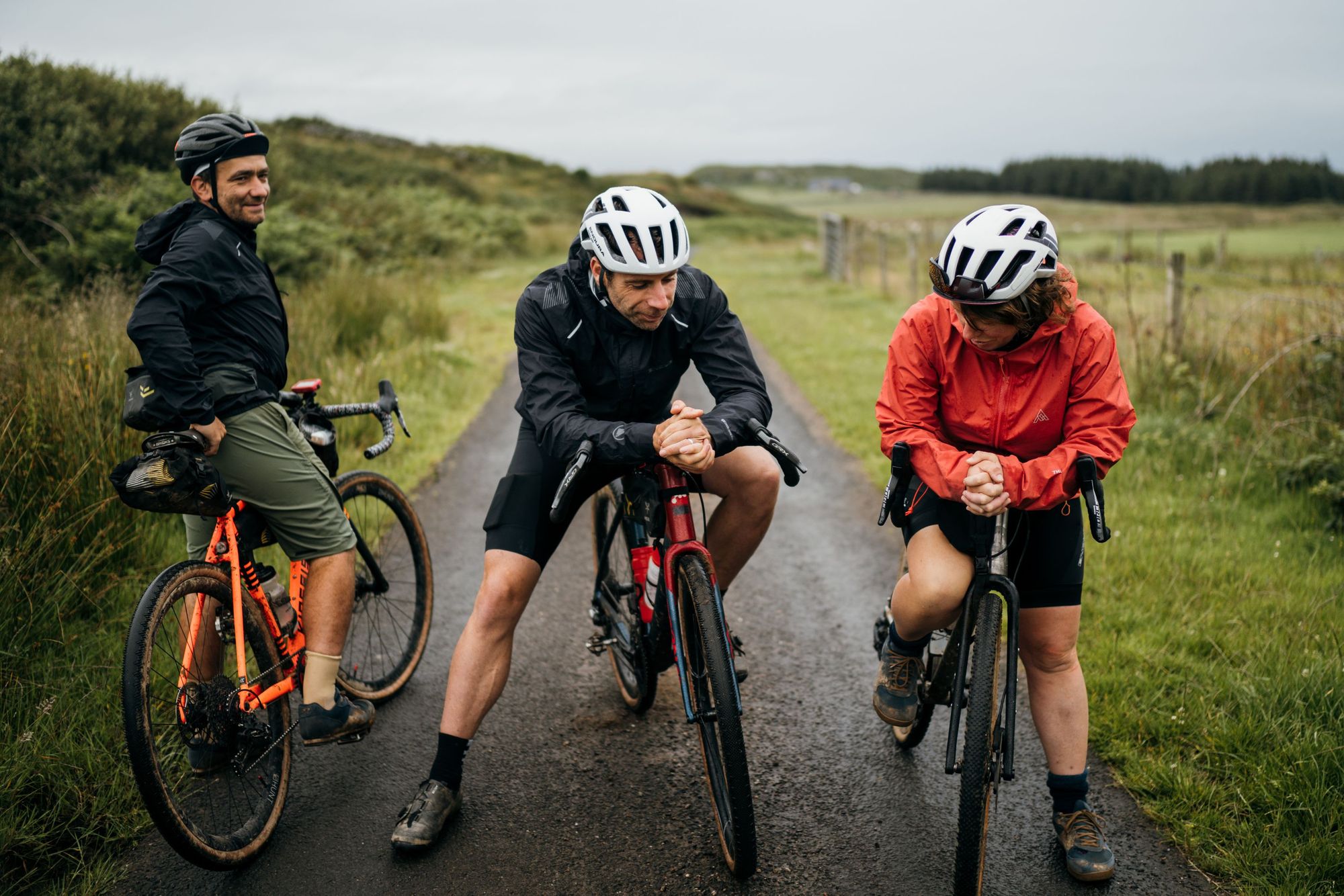 From left to right, Markus Stitz, Mark Beaumont and Jenny Graham on the trails in Argyll. Photo: Markus Stitz