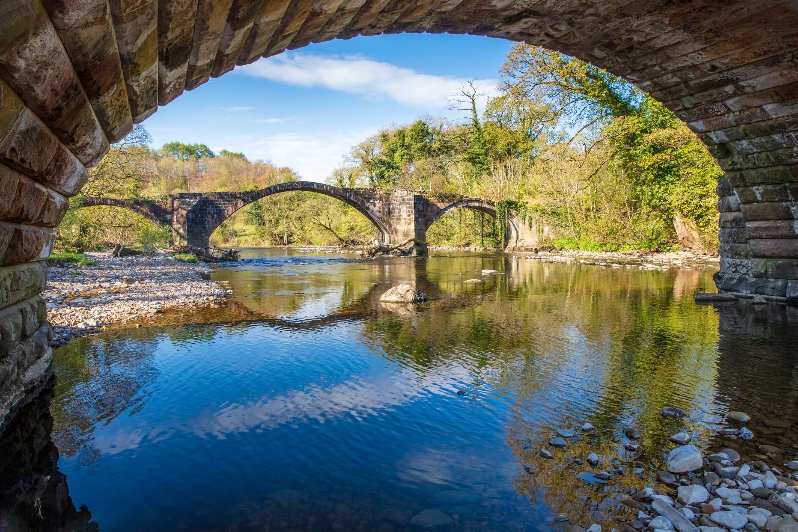 Cromwell Bridge, crossing the River Hodder in Whalley, Lancashire, UK.