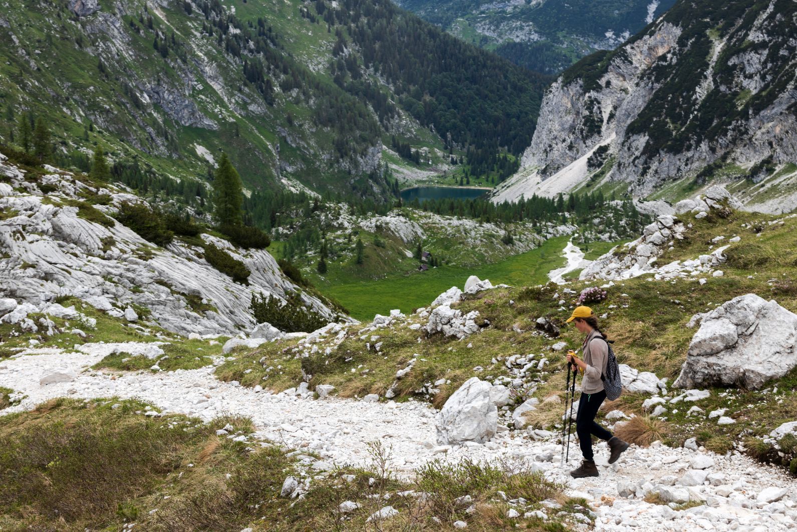 A woman descends to a lake in Triglav National Park in Slovenia.