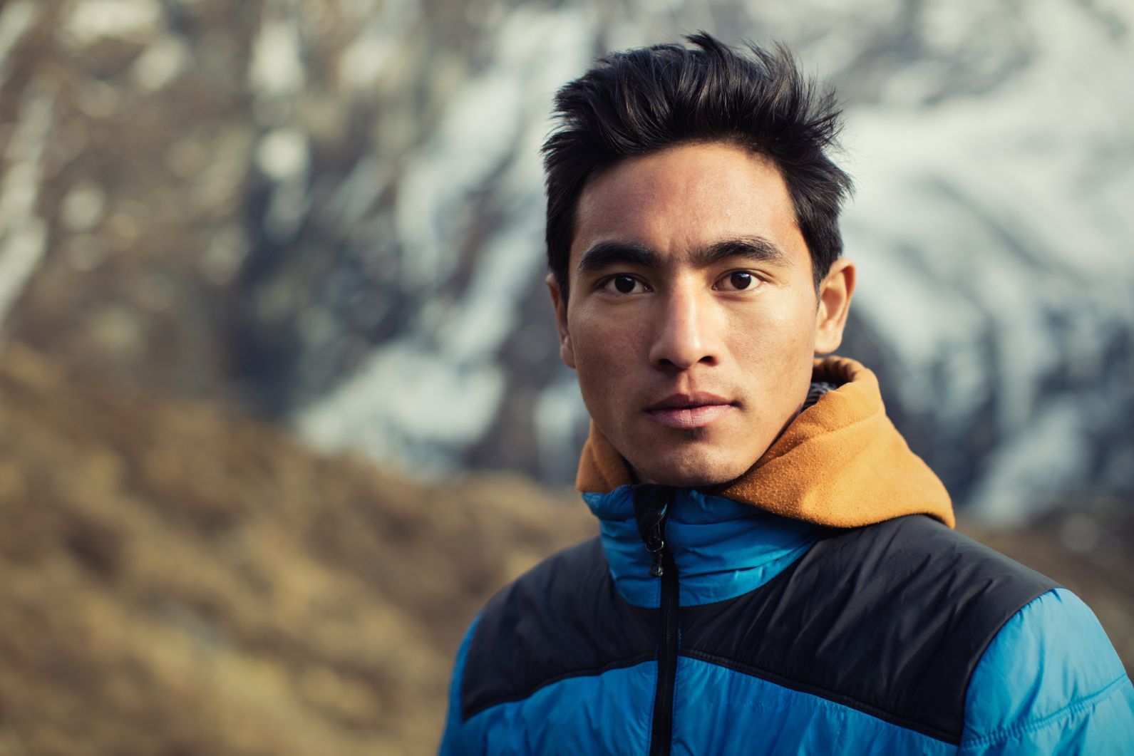 A portrait of young local mountain guide in Nepal. Local guides here are renowned for their strength and expertise. Photo: Getty