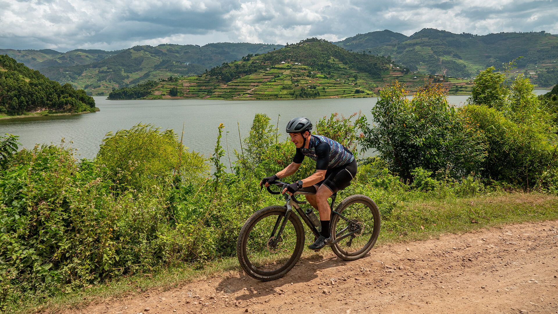 A scene from stage one of the Uganda Cycling Trail, which passes the pictured Lake Bunyonyi. Photo: FatPigeon.cc