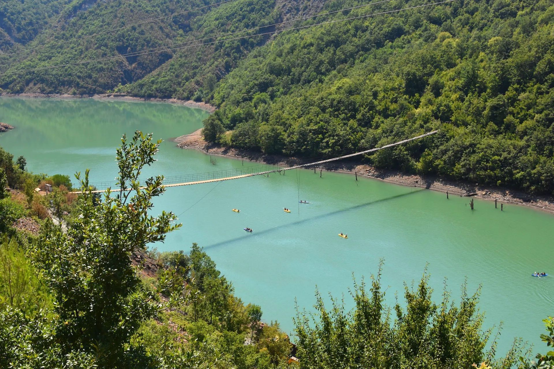 Kayakers paddling across the clear waters of Karavasta Lagoon, Albania