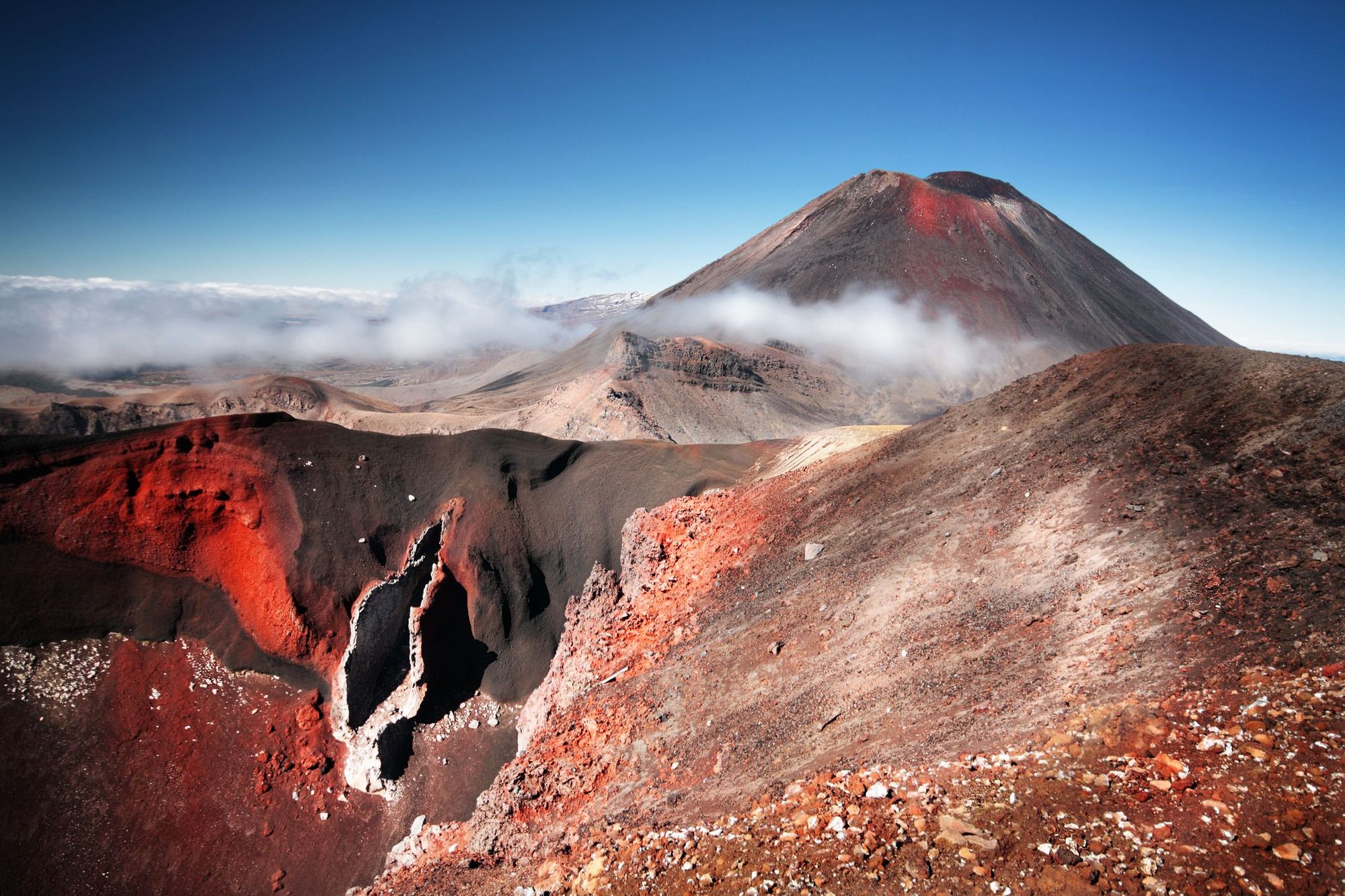 Mount Ngauruhoe, in New Zealand, coloured red and black through volcanic processes