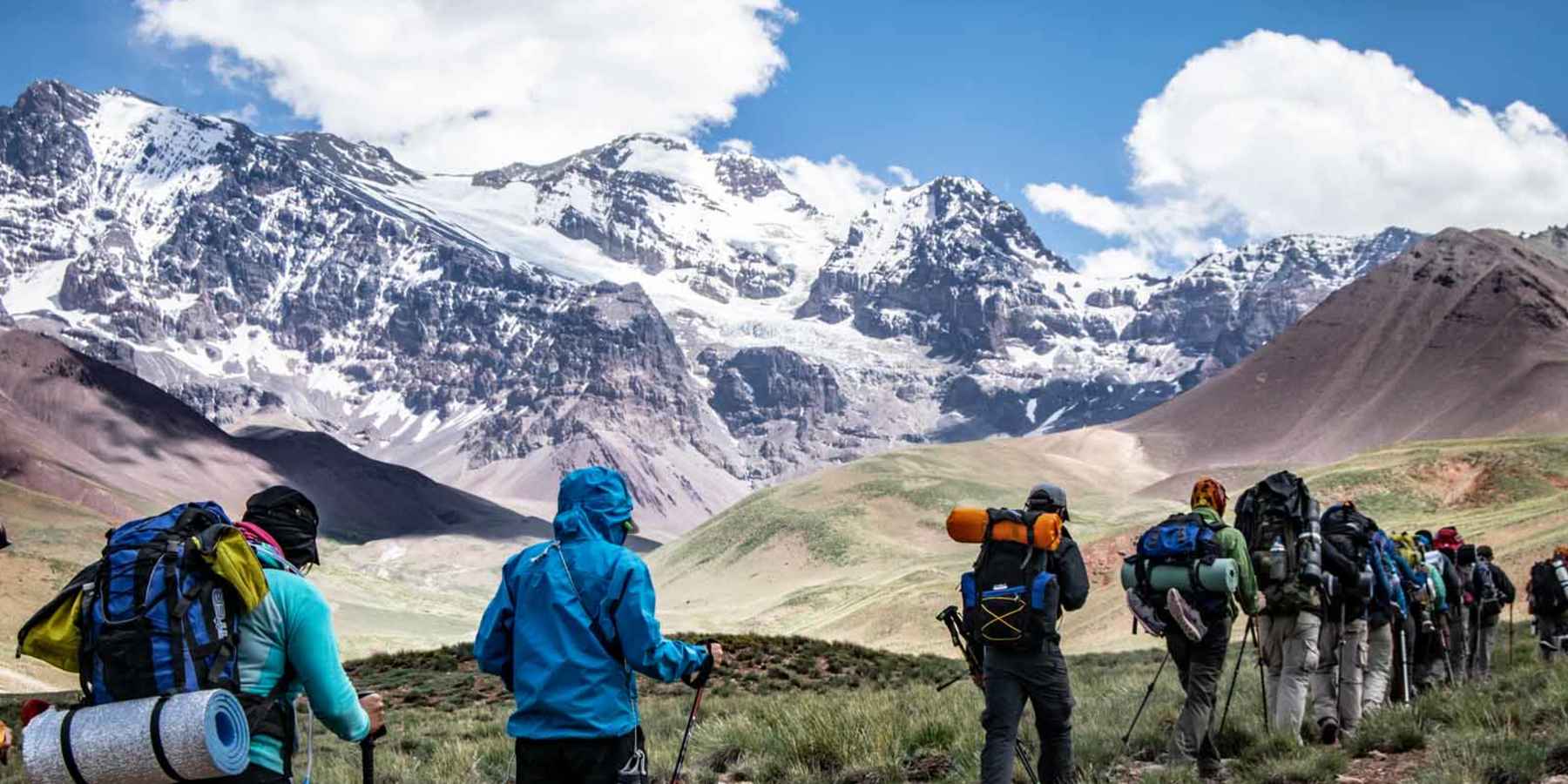 Hikers on the historic Piuquenes Pass, in the Andes Mountains