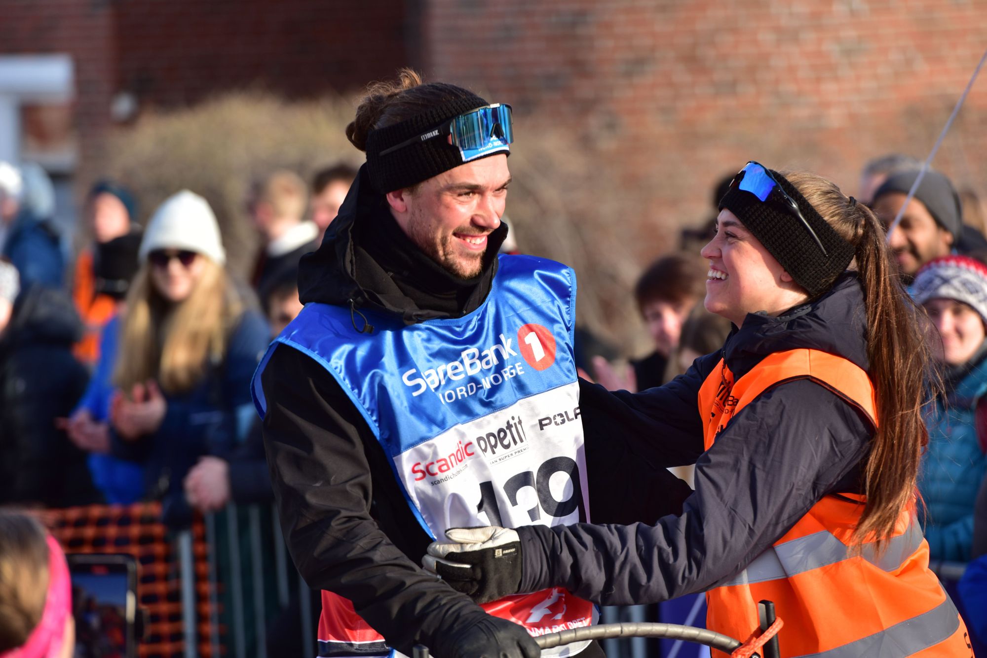 Brage Jæger being congratulated by his sister after coming fifth place in the Finnmark Race