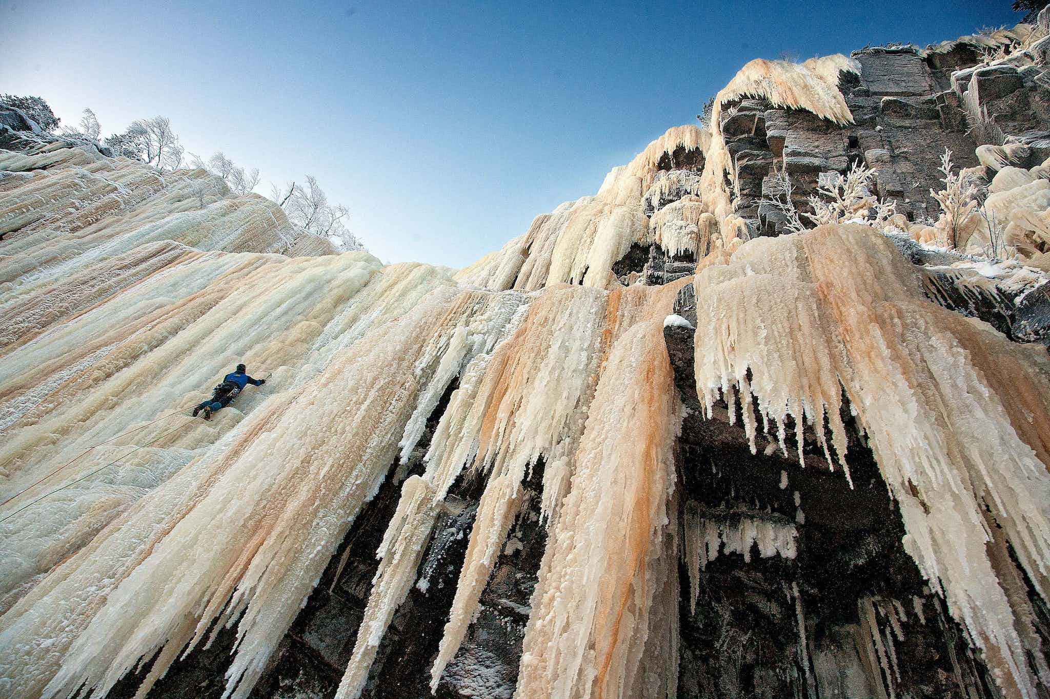The drama and beauty of a frozen waterfall is hard to rival. Photo: Bliss Adventures