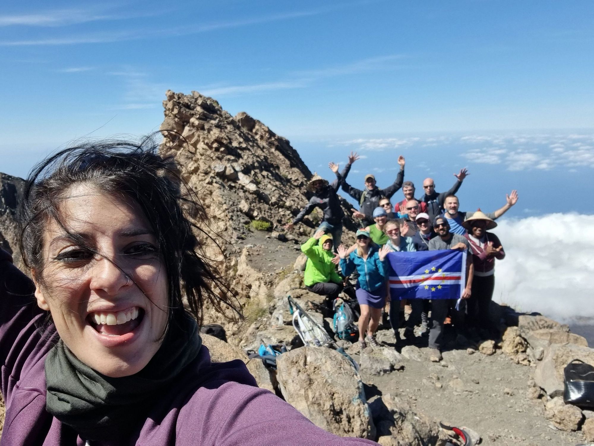 Hikers pose at the summit of Pico du Fogo, Cape Verde