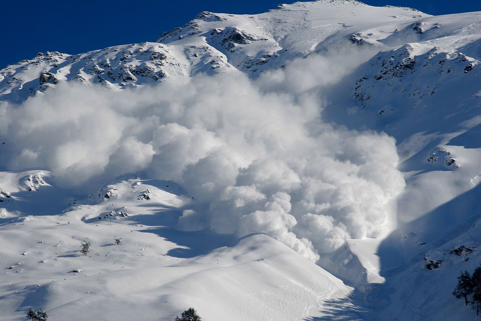 A dry snow avalanche in the mountains.