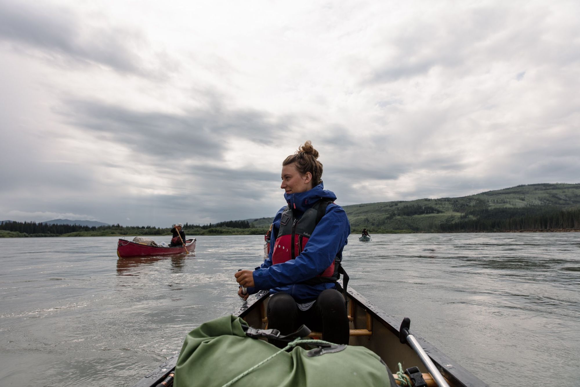 A woman canoeist on the Yukon River.