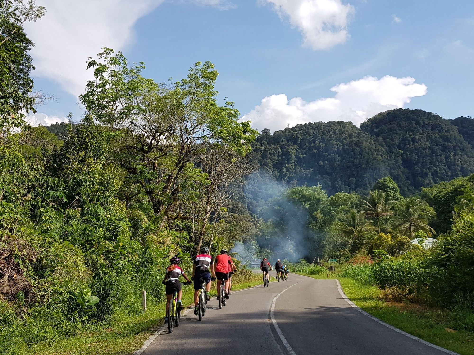 A cycling group travel through the rainforests of Borneo. Photo: Paradeso Borneo