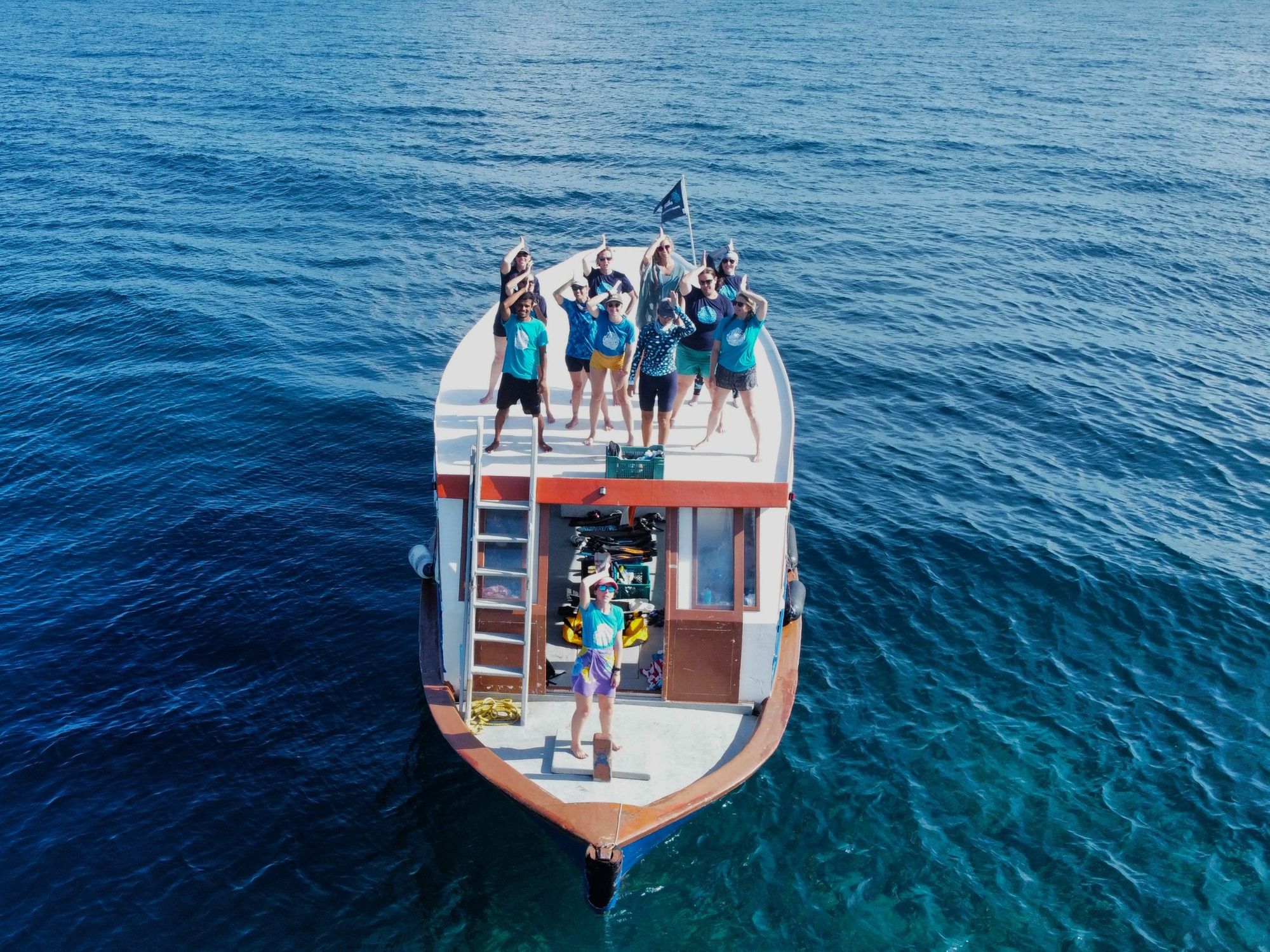 Volunteers with Secret Paradise Maldives and MWSRP out on the water.