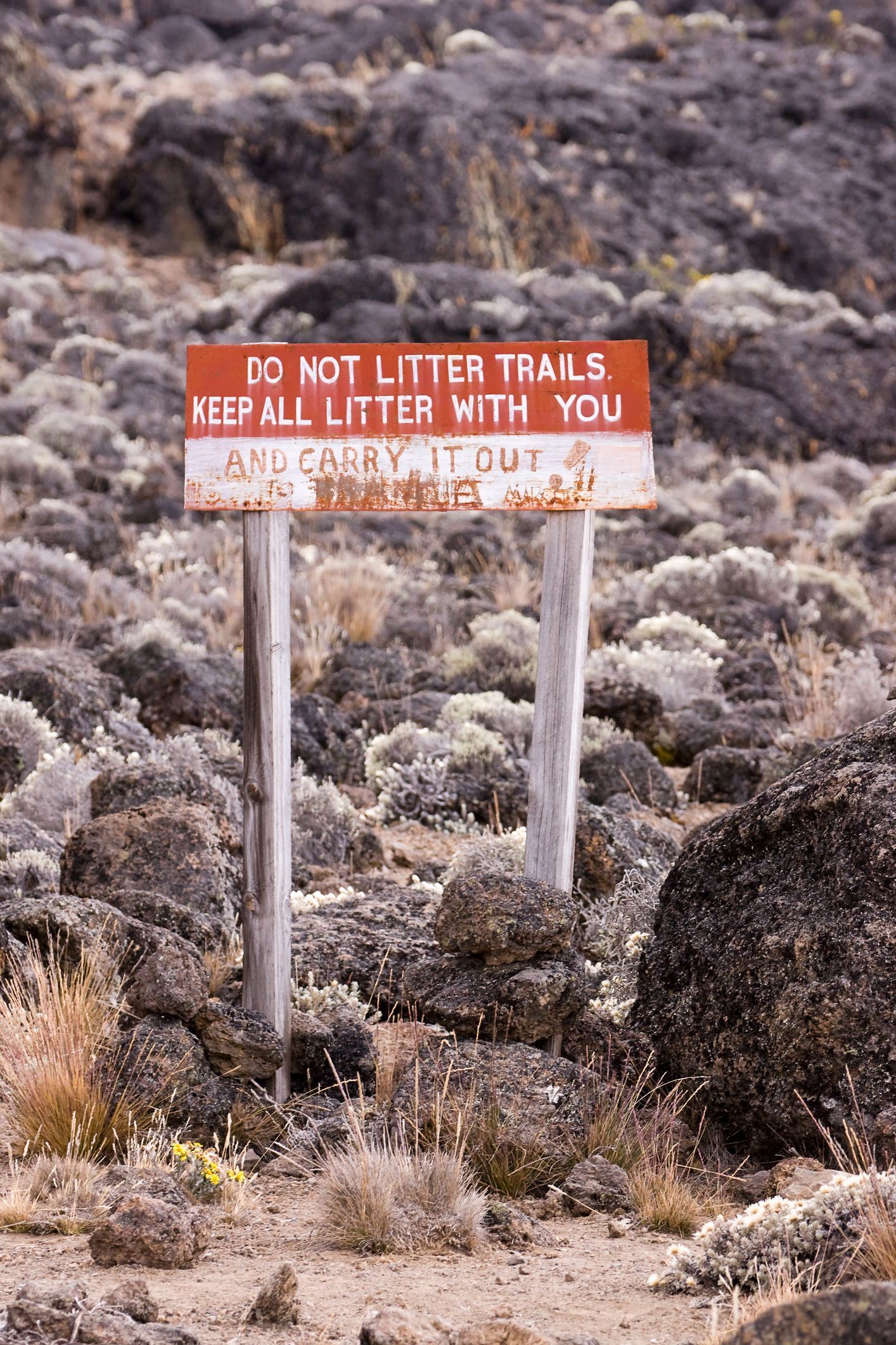 A sign in Kilimanjaro National Park which reads "do not litter trails."