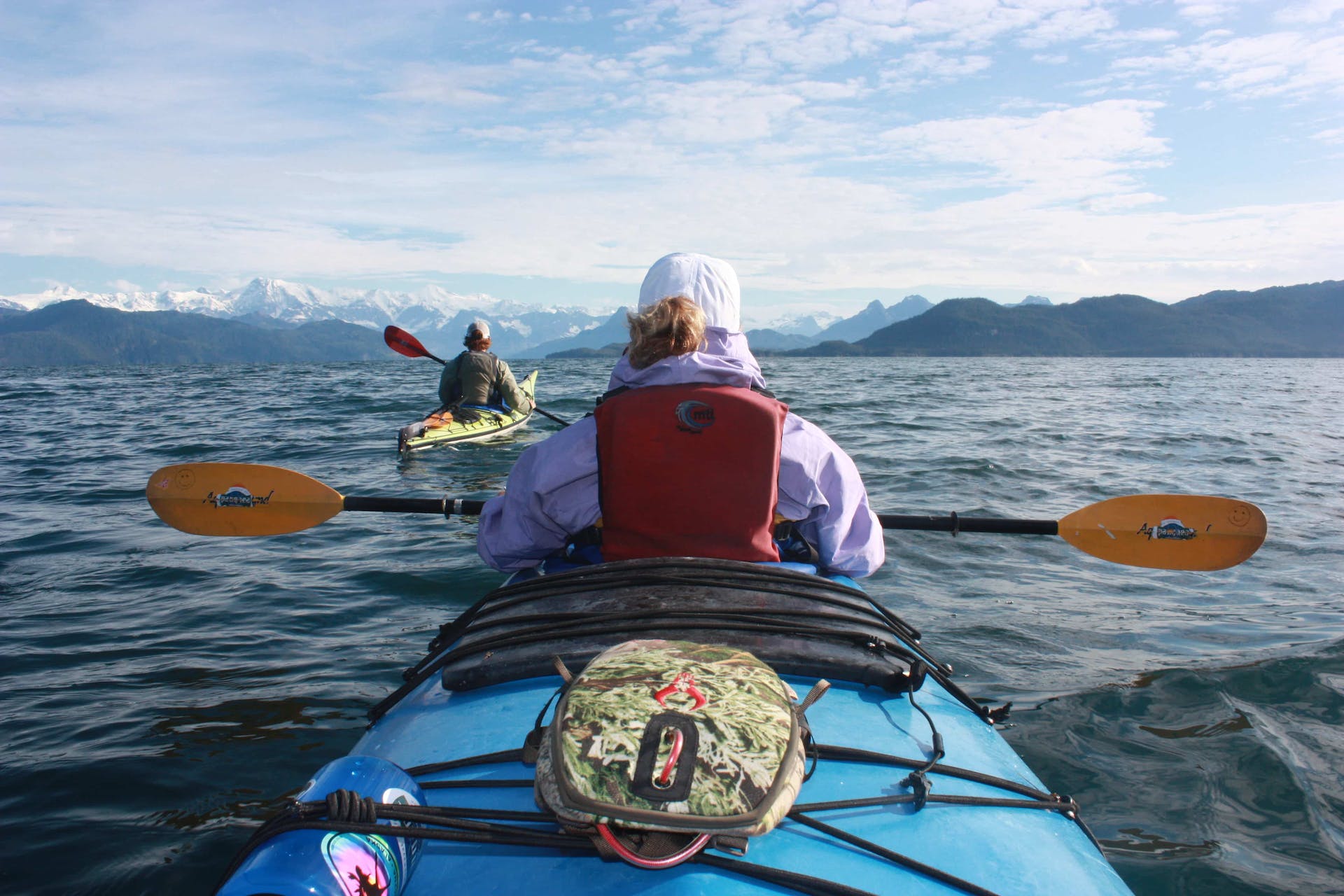 Two kayakers enter Shoup Bay, Alaska. 