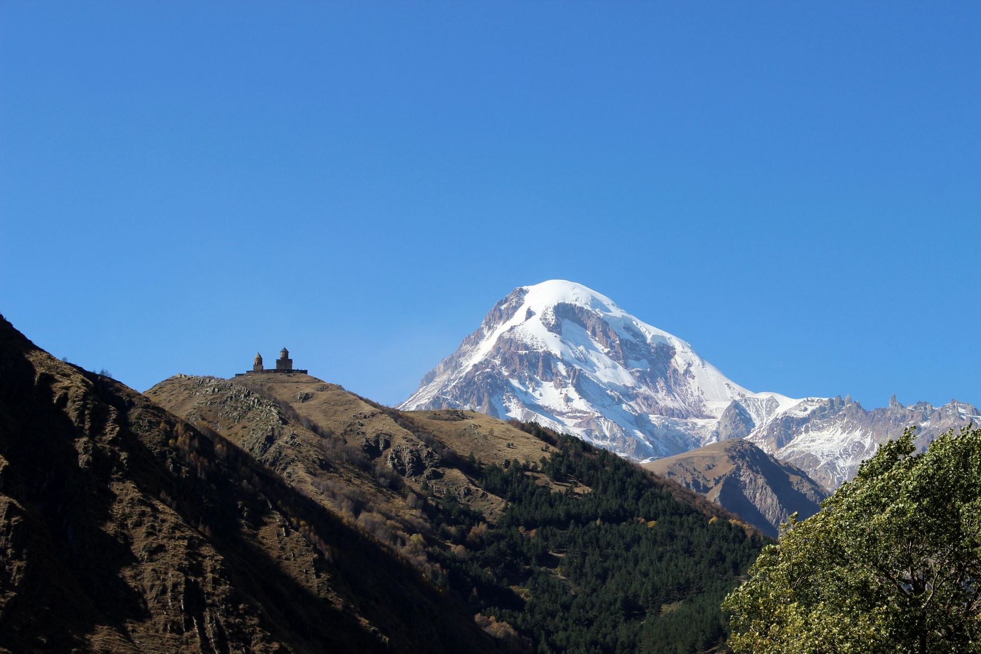 Gergeti Trinity Church, Georgia, with Mount Kazbek in the background.