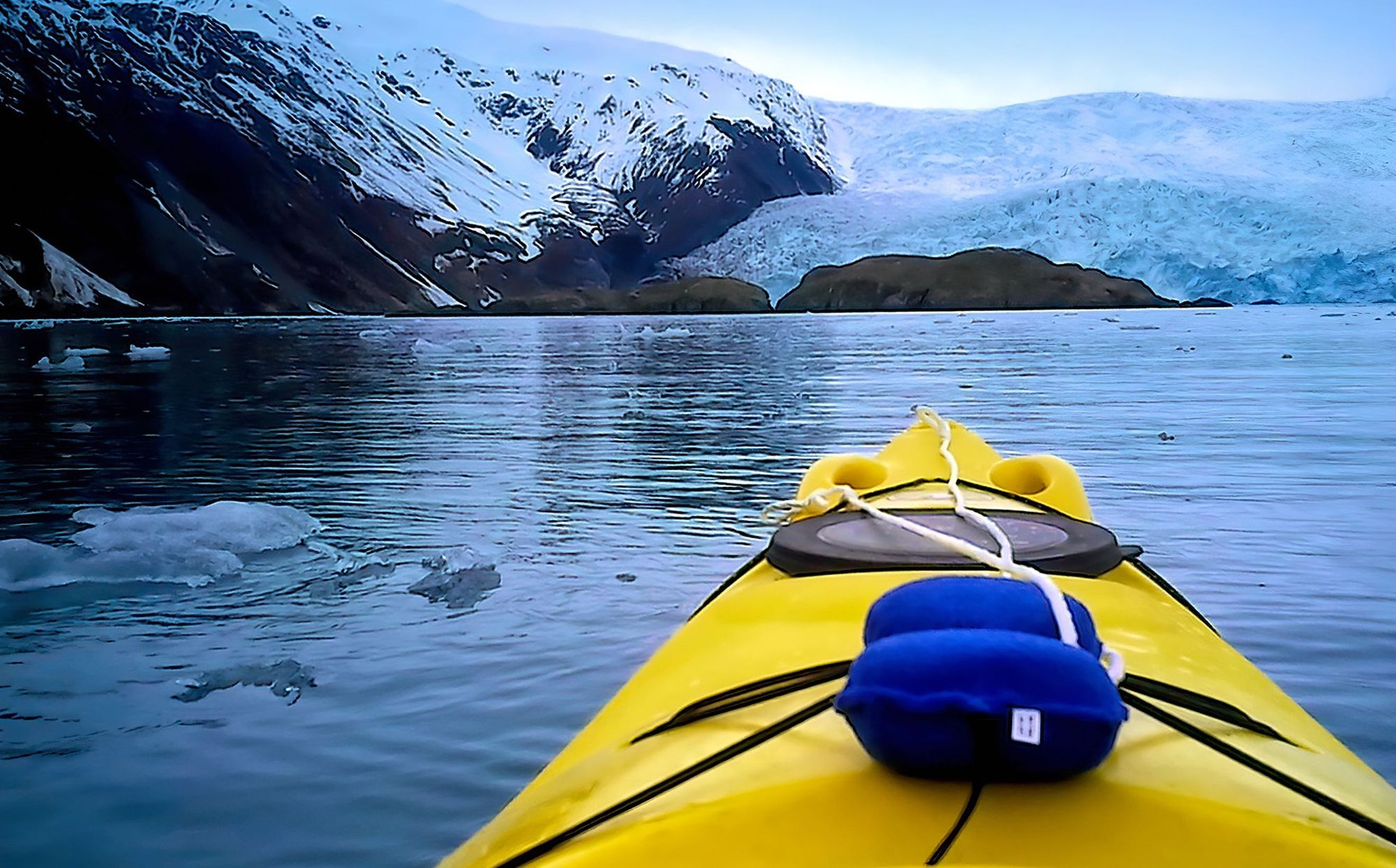 Kayaking in the icy Kenai Fjords, Alaska.