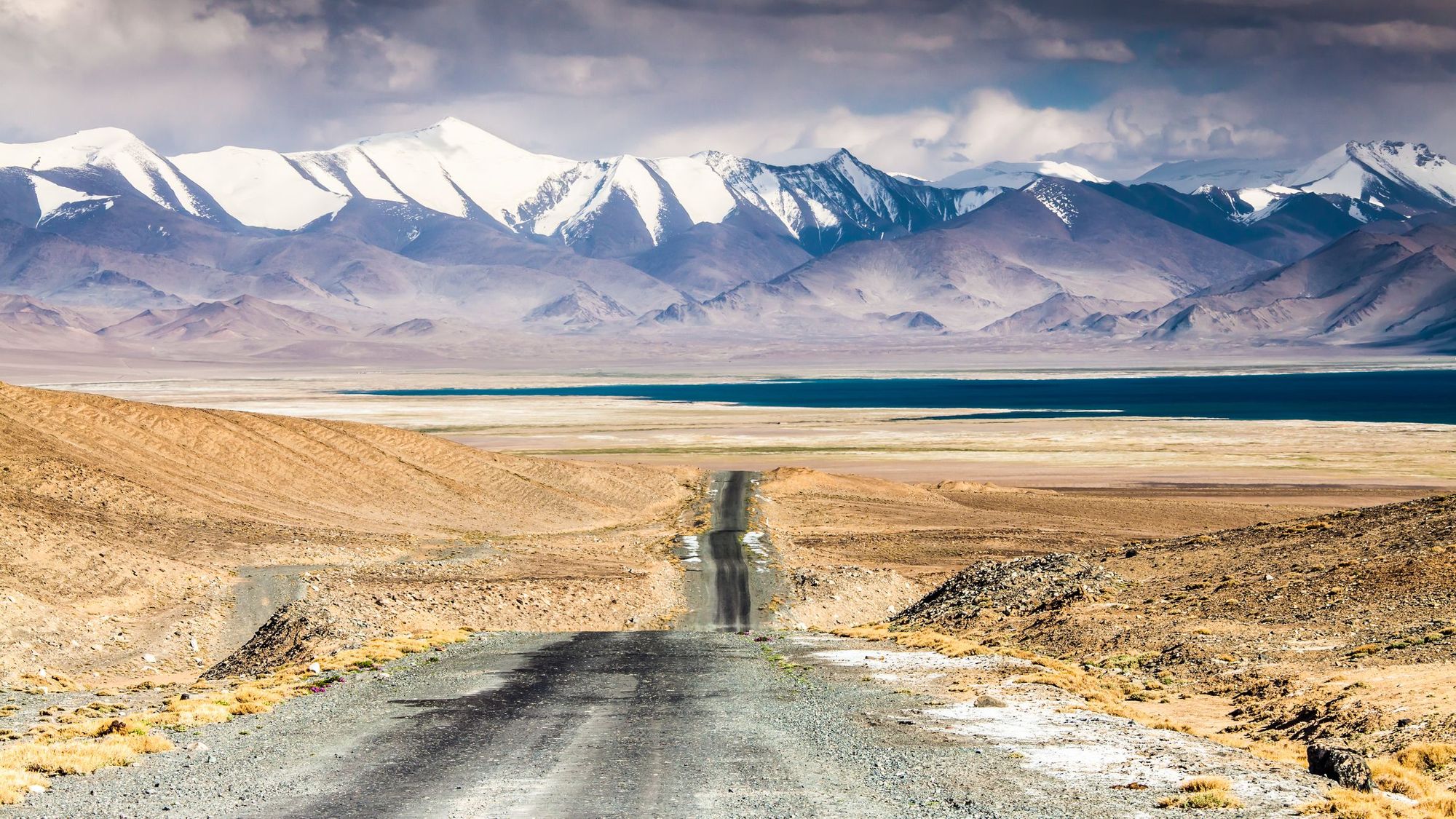 A road leading to Karakul Lake in the Pamir Mountains, Tajikistan.