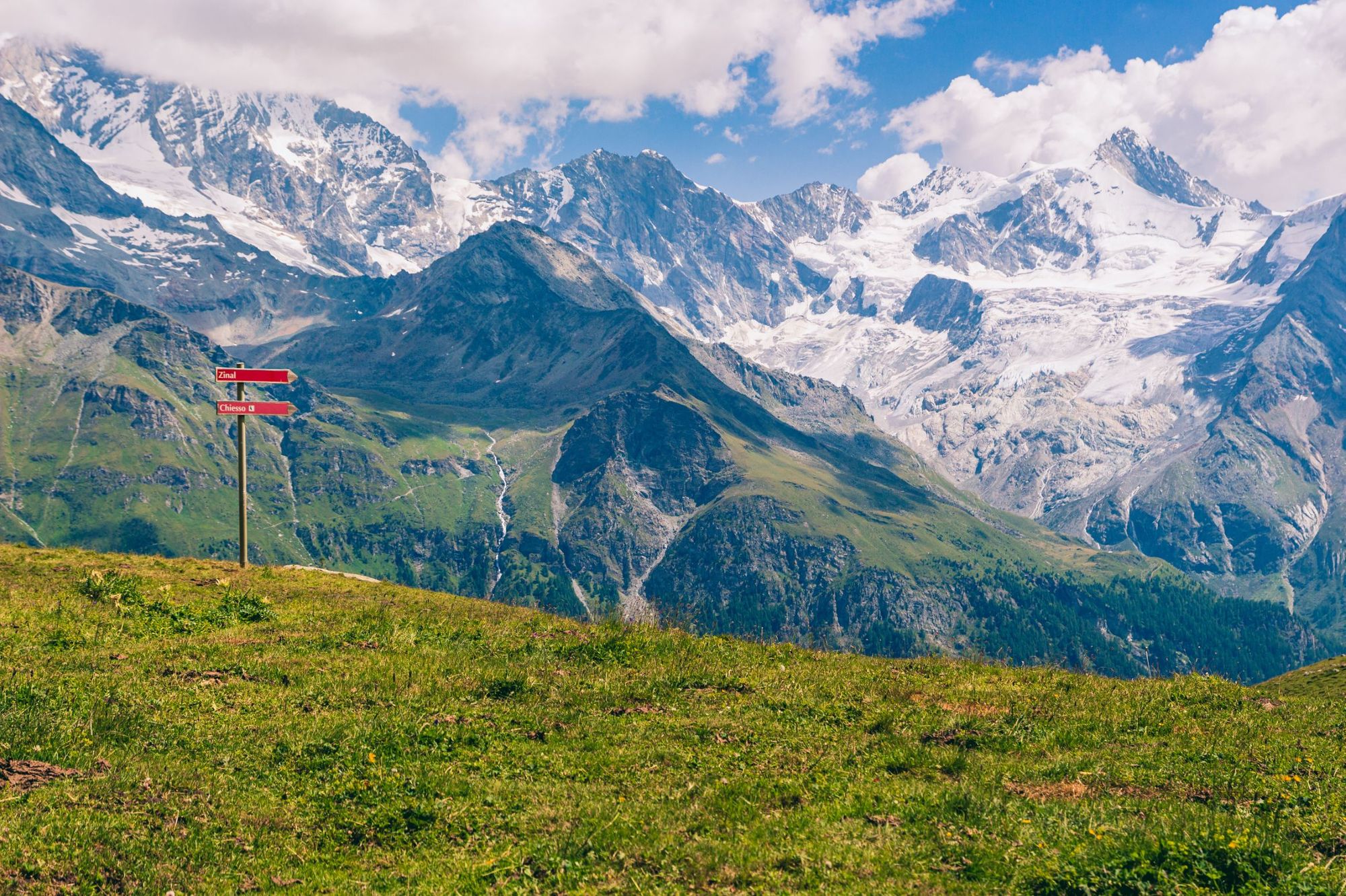 A view of the high snowy peaks of the Pennine Alps under cloudy skies, seen from Sorebois, near Zinal. Photo: Getty