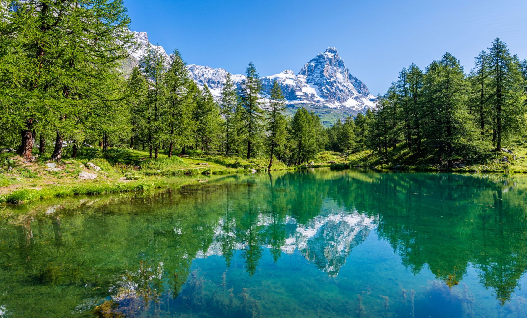 An idyllic morning view at the Blue Lake, with the Matterhorn reflecting on the water, in Valtournenche, near Cervinia. Photo: Getty