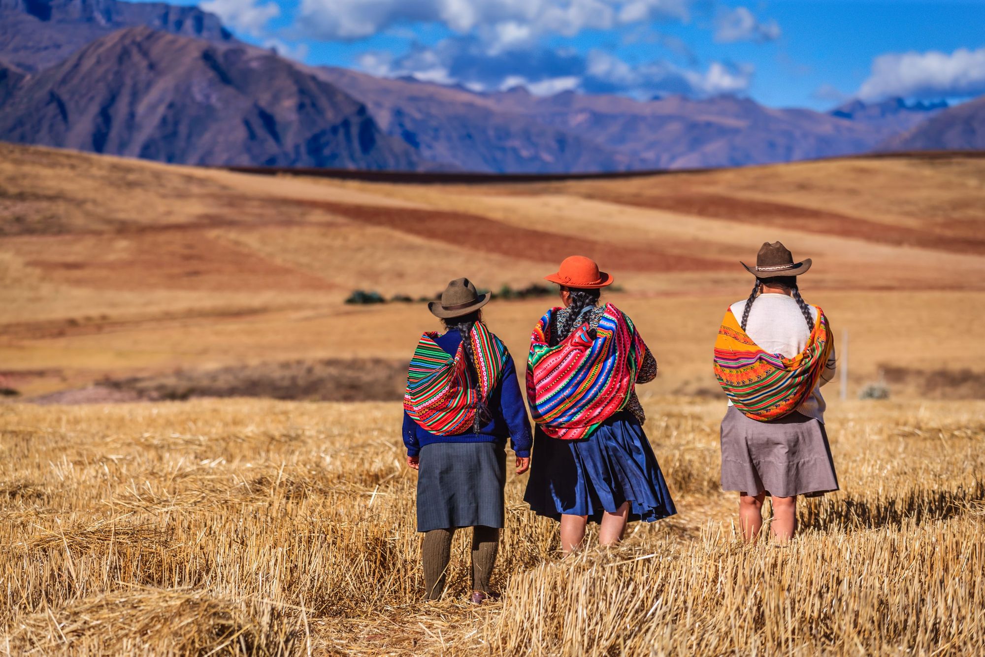 Bolivian 'cholitas' - women wearing wide hats and brightly coloured indigenous dress. Photo: Getty