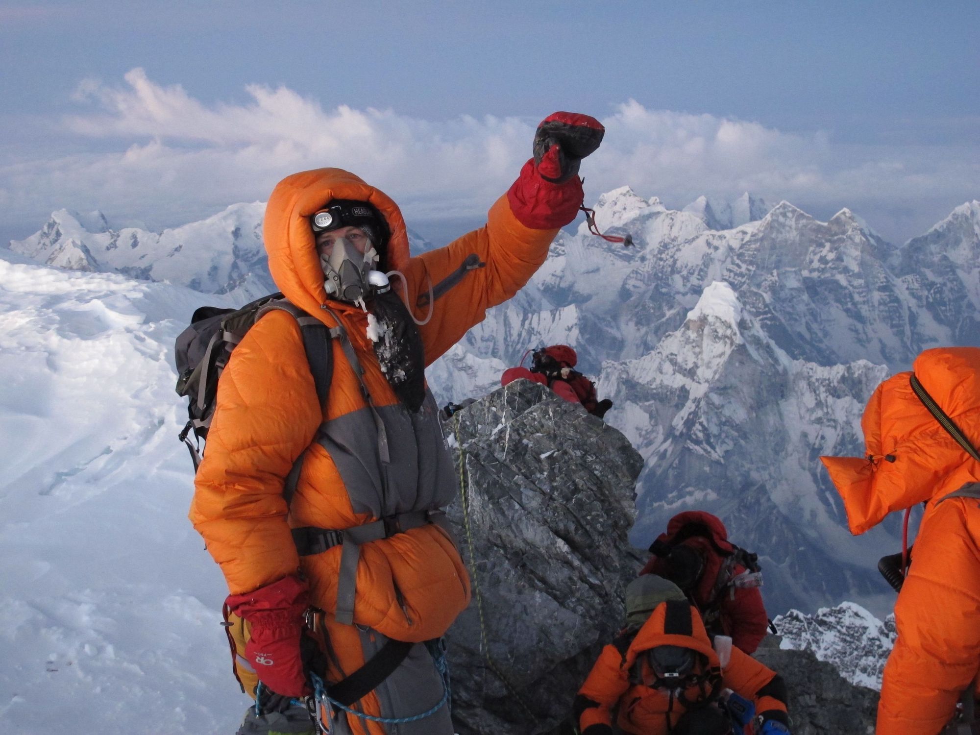 Jon Kedrowsk celebrating at the top of Mount Everest, May 2012
