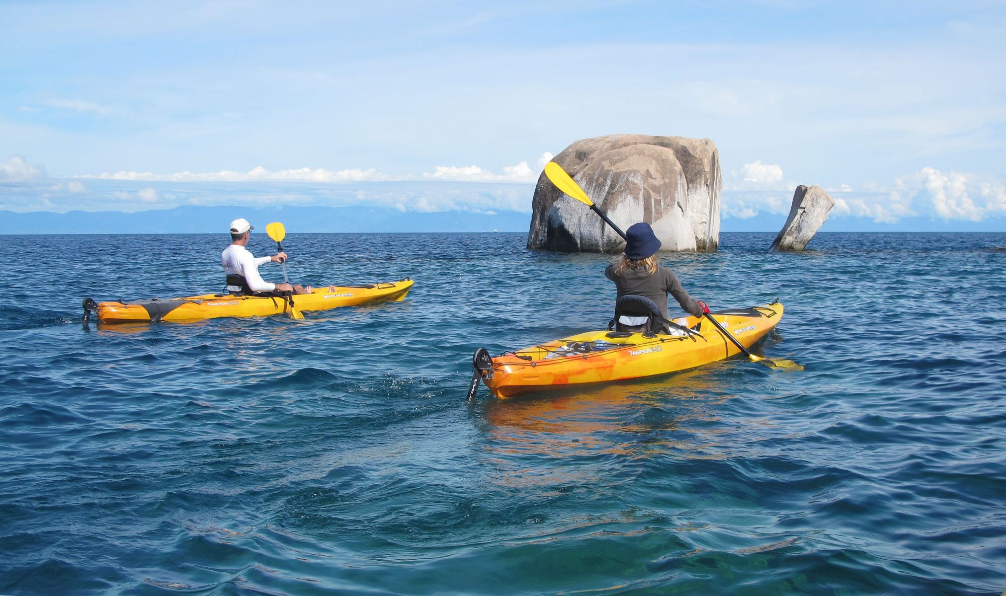 Kayakers paddling across Lake Tanganyika, in Tanzania