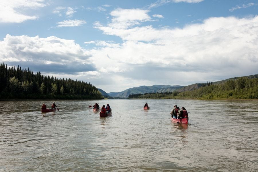A group of canoeists paddle the Yukon River, Canada