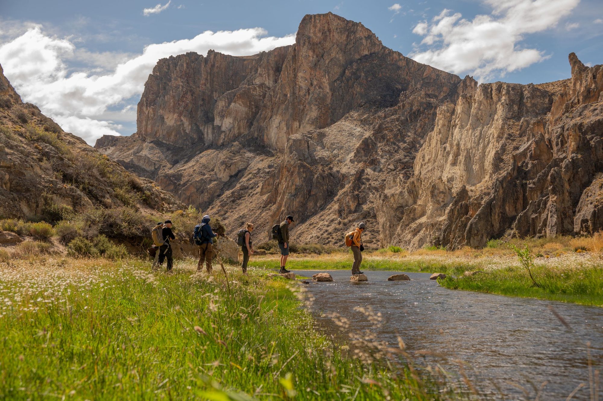 A river crossing on the Huella de Gradin trail, a lush canyon hidden beneath the steppe. Photo: Horacio Barbieri