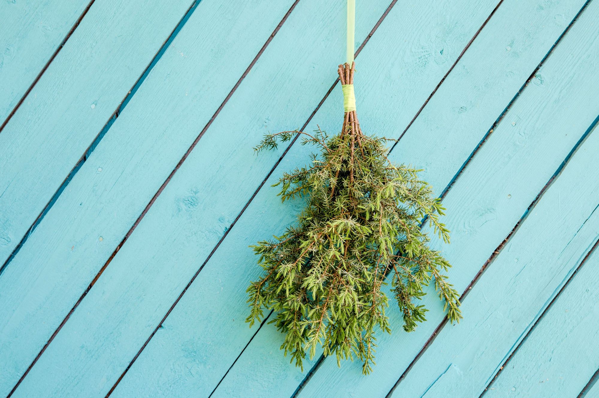 Up for a beating? A collection of twigs are used to whisk, get the blood moving and clear the air. Photo: Getty