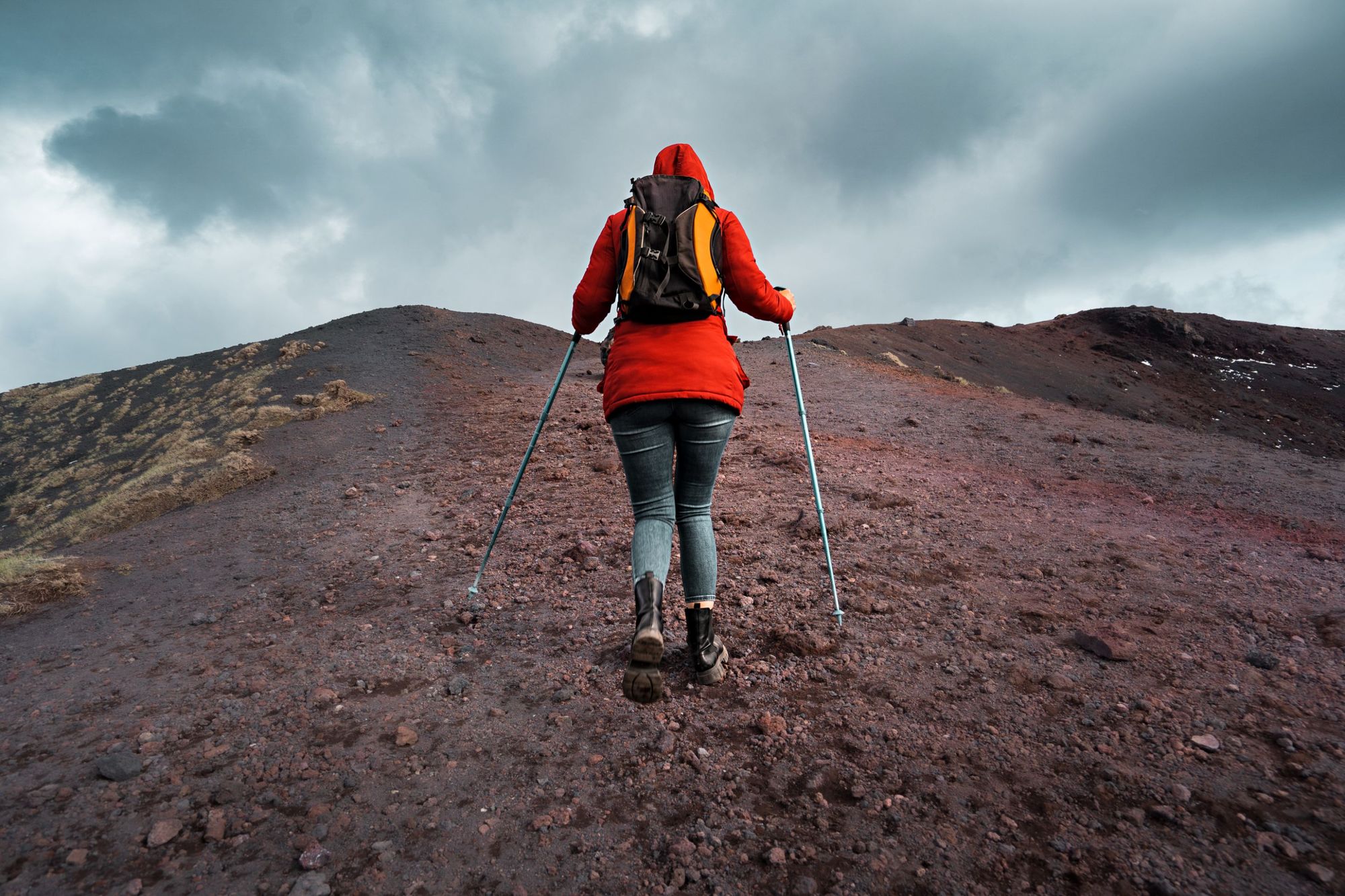 A hiker climbs Mount Etna, in Sicily. Photo: Getty