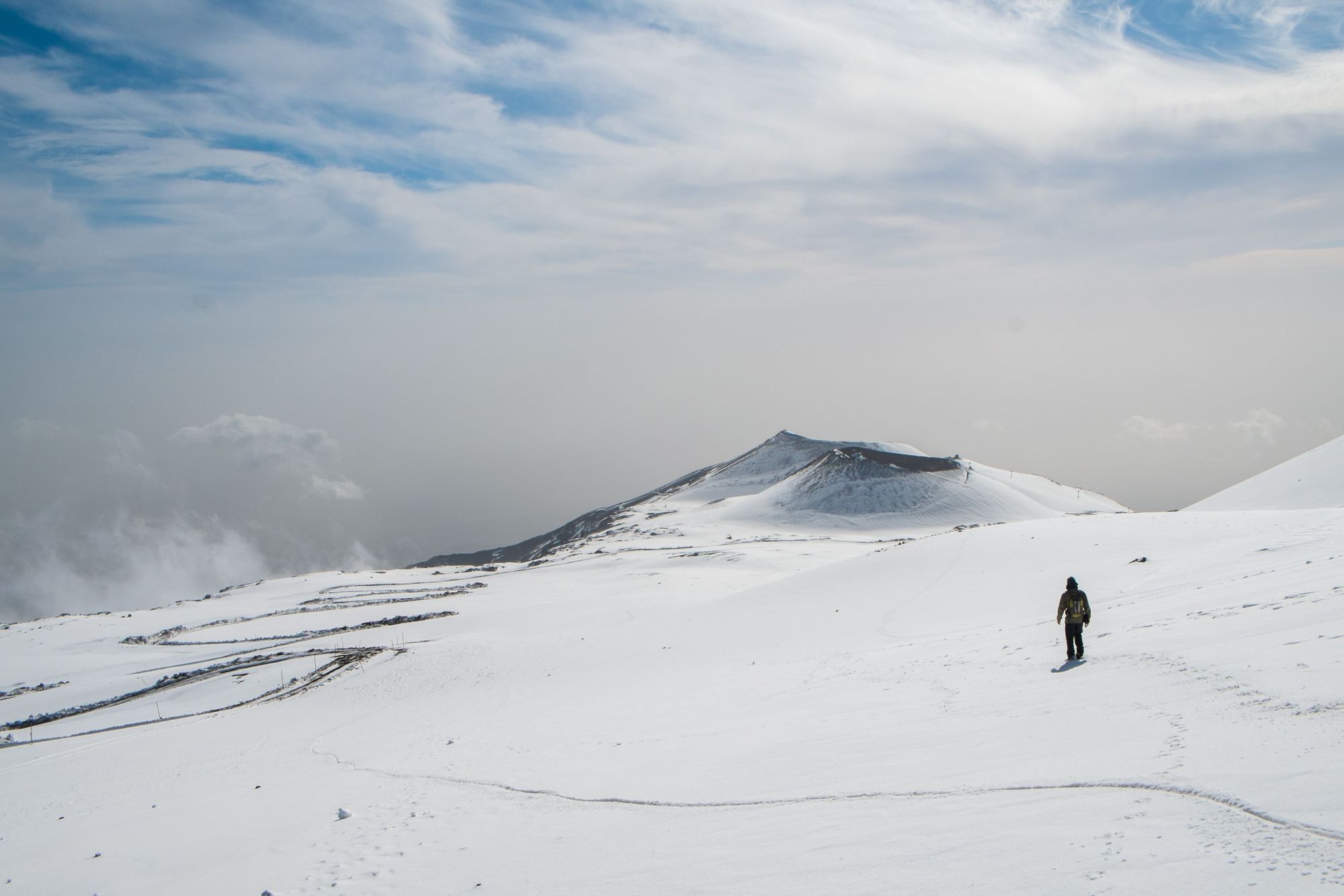 Walking on Mount Etna in winter, when this fiery landscape is covered in snow.