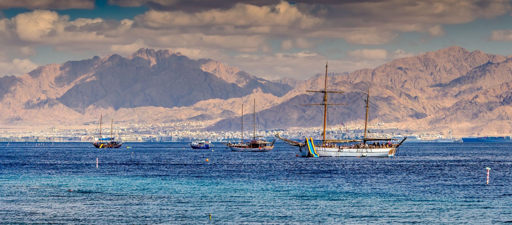 Boats out on the Red Sea, which is reached at the end of the Jordan Trail. Photo: Getty