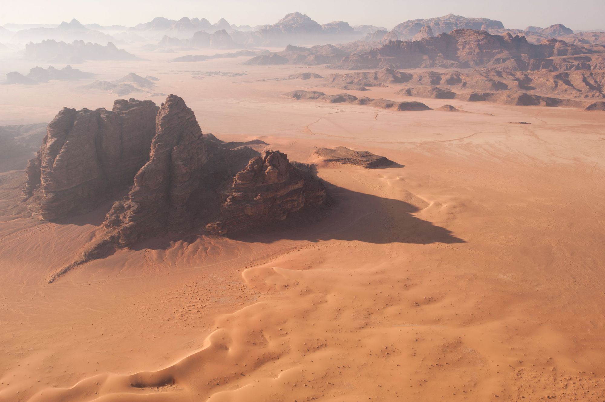 A stunning aerial view of Wadi Rum, also known as the Valley of the Moon, cut into sandstone and granite rock in southern Jordan. Photo: Getty