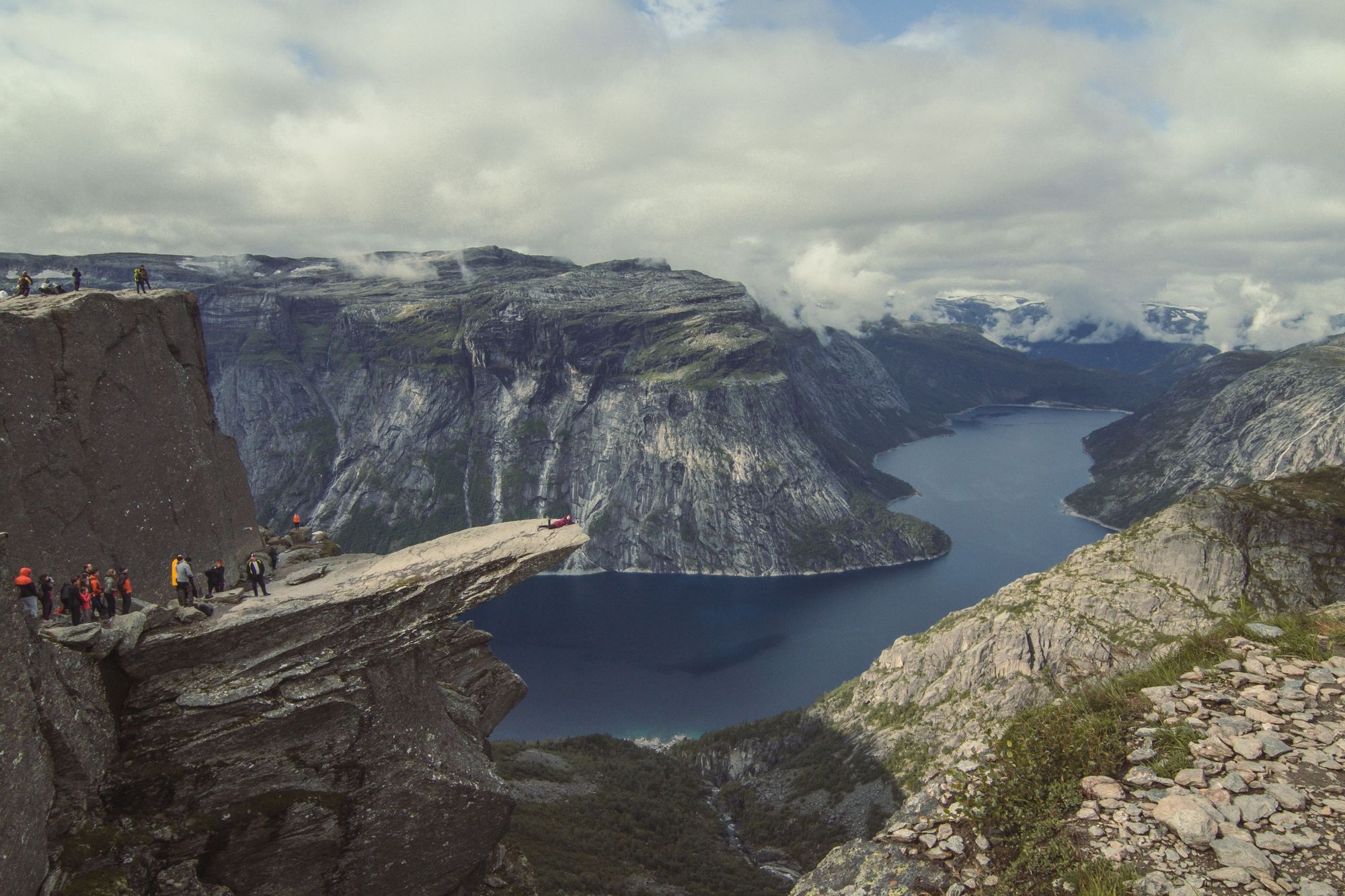 Hikers queue on the Trolltunga rock in Norway, waiting for their chance to take a photo alone on the rock. Photo: Getty