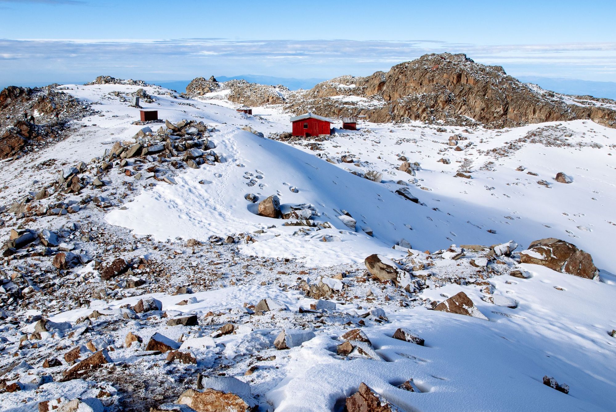 The Austrian Hut, surrounded by snow just 20km from the equator, on Mount Kenya. Photo: Getty